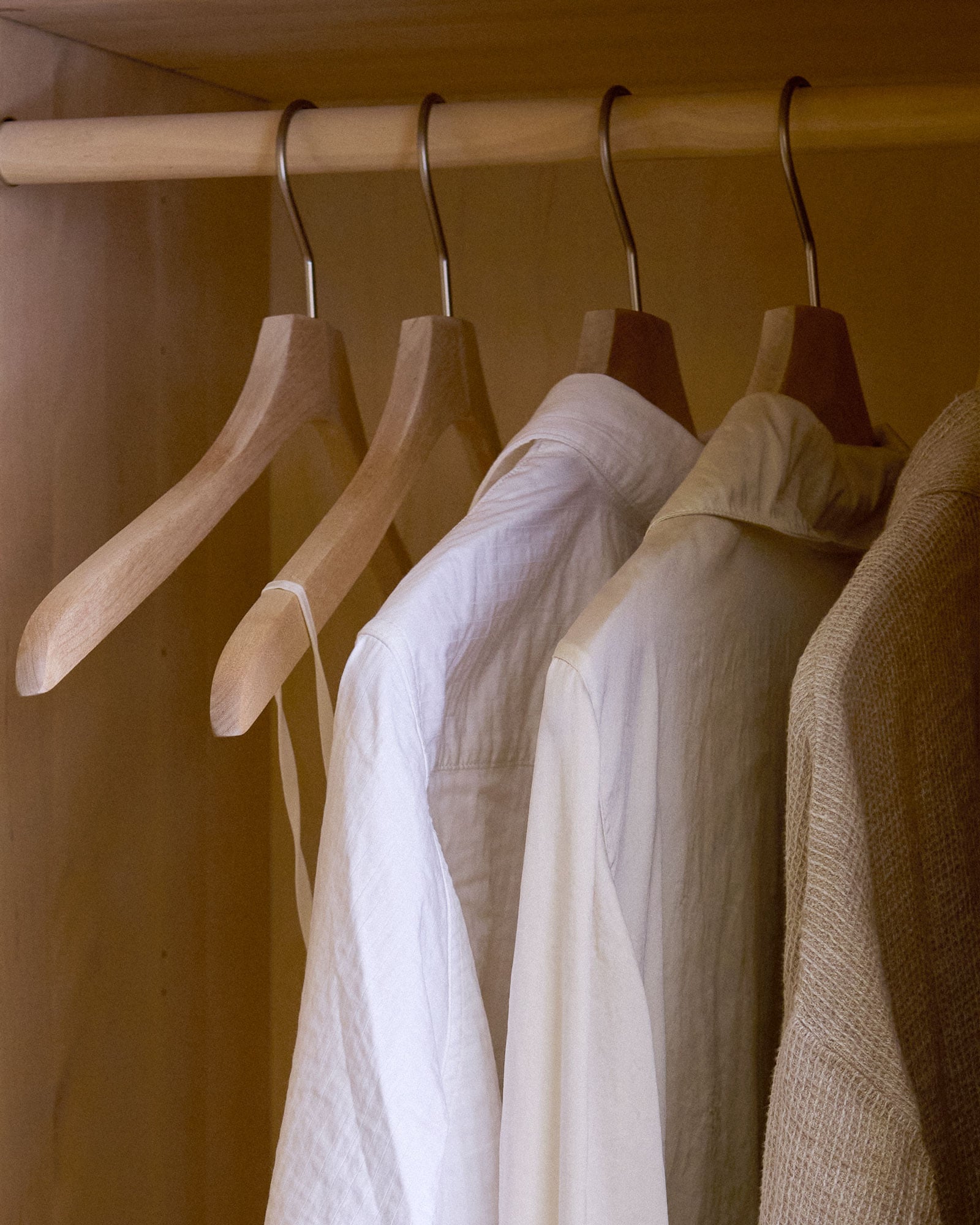 hangers hanging on a clothes rail