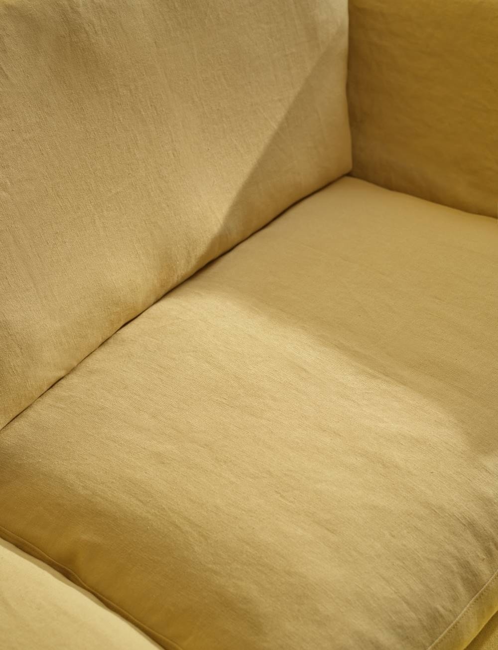 yellow sofa in natural material